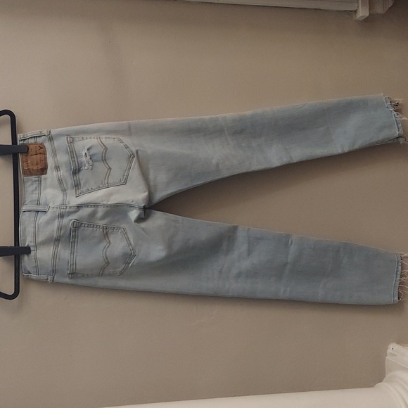 AMERICAN EAGLE OUTFITTERS Extreme Flex Light Blue Wash Distressed Skinny Jeans - Picture 10 of 14